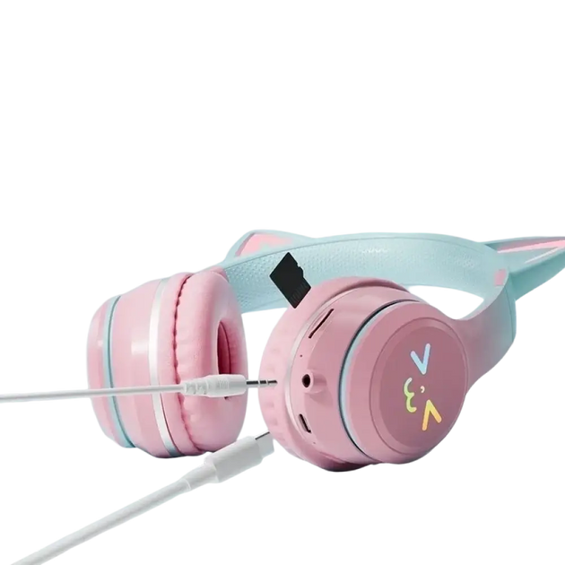 Casque bluetooth rose avec micro pour enfants et oreillettes chat équipé d’un slot carte mémoire et chargement sans fil