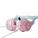 Casque bluetooth rose avec micro pour enfants et oreillettes chat équipé d’un slot carte mémoire et chargement sans fil