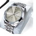 Montre à quartz pour homme, de couleur argentée, avec affichage de la date et index en diamants.