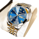 Montre pour homme en argent et or bicolore avec un cadran bleu.