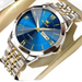 Montre pour homme en argent et or bicolore avec un cadran bleu.