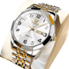 Montre à quartz pour homme en acier inoxydable bicolore argenté et doré, avec cadran blanc et affichage de la date.