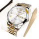 Montre à quartz bicolore argent et or pour homme, avec cadran blanc et affichage de la date.