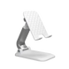 Support de téléphone pliable réglable, blanc et gris, avec plaque arrière texturée.